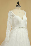 A Line Long Sleeves Wedding Dresses Tulle With Applique And Sash Sweep Train