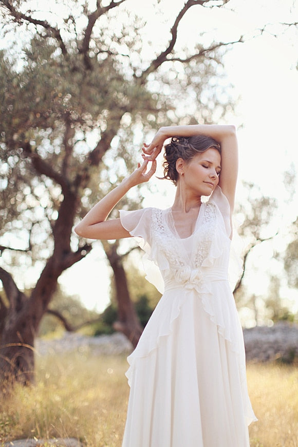 Elegant A-Line Ivory Flower Cap Sleeve V-Neck Chiffon Open Back Wedding Dresses